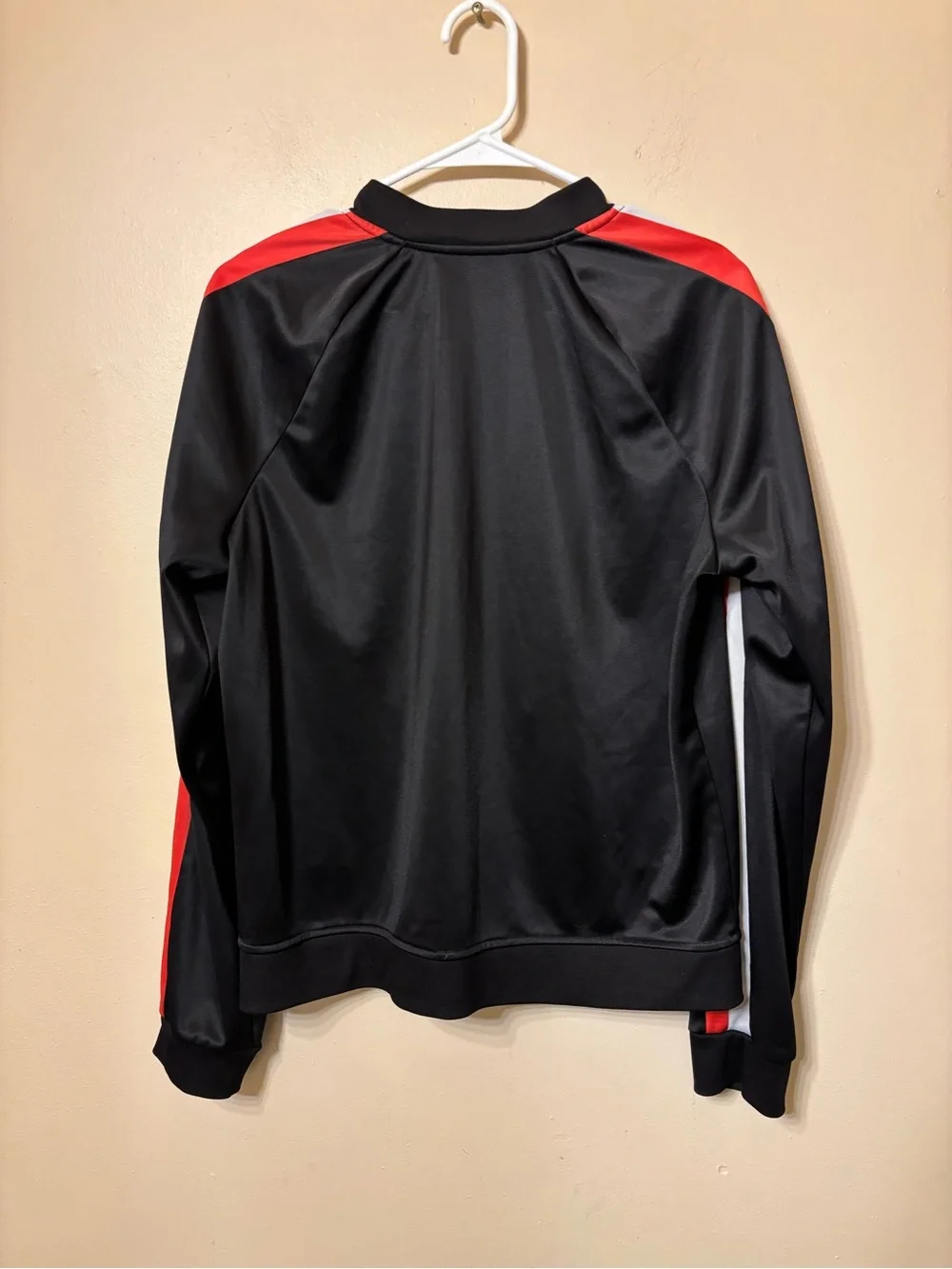bebe sport Black Bomber Jacket with Red and White Sleeve Stripes size L
